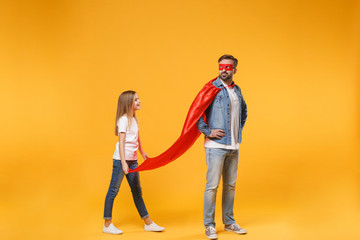 Bearded man in casual clothes Super hero costume have fun with cute child baby girl. Father little...