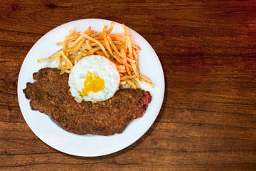 Meat Breaded with French Fries and Egg