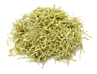 dried honeysuckle flowers on the white background 