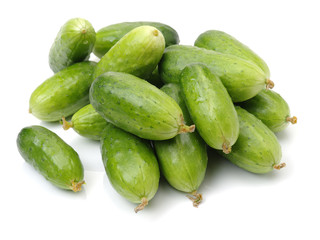 Green cucumber on the white background 