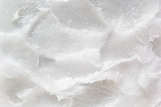 Coconut oil texture. Food ingredient, healthy fat. White coconut butter closeup background