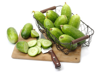 Green cucumber on the white background