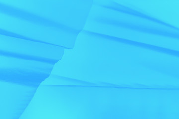 Blue abstract gradient background with paper waves