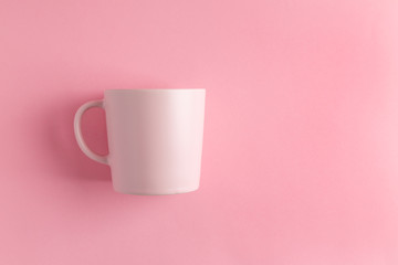 Empty pink Mug on pink background with copy space