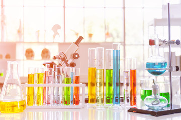 Various glass tubes and equipment used in scientific laboratories, on desks, in laboratories, try researching