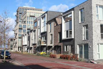 Fototapeta na wymiar Newly builded residential street with modern design on the Zeeburgereiland, Amsterdam
