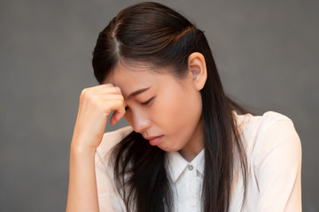 sick woman having fever or headache; concept of stress, depression, biohazard, biological hazard,...