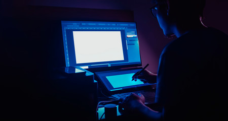 freelance designer working at night in his home. with copyspace - obrazy, fototapety, plakaty