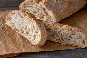 Sliced homemade  breads on wooden table