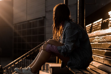 fashionable woman in blue jean jacket