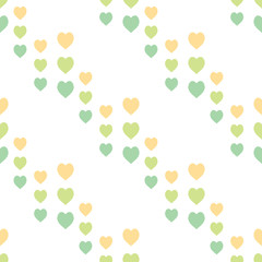 Seamless pattern with cute yellow and green hearts on white background. Vector image.