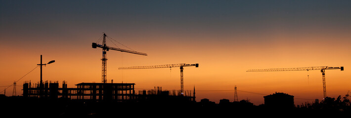 building the construction at sunset