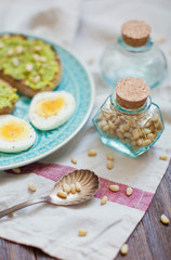 Obraz na płótnie Canvas Healthy toast with avocado cream and egg