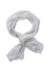 Subject shot of a white viscose scarf with a black polka-dot print. The tied semi-transparent scarf is isolated on the white background.  