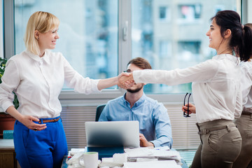 Team of architects working in the office	