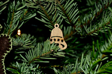 Decoration on Christmas tree - plywood bell