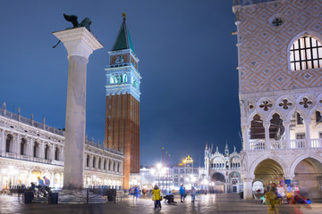 Fototapeta premium Piazza San Marco square with Doges Palace in Venice city at night, Italy