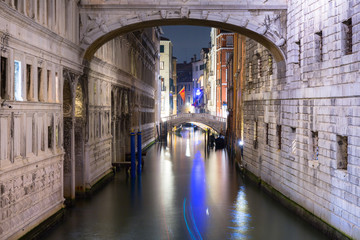 Fototapeta na wymiar Canals of Venice city with beautiful architecture at night, Italy