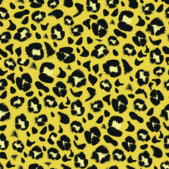 Seamless leopard print on yellow background in vector