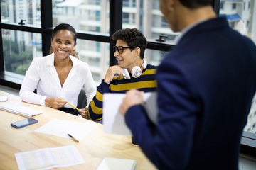 Close up young business person sharing and discuss job after meeting in the offices.