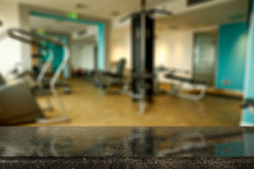 Table background of free space and gym interior 