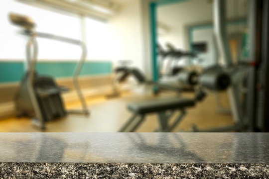 Table background of free space and gym interior 