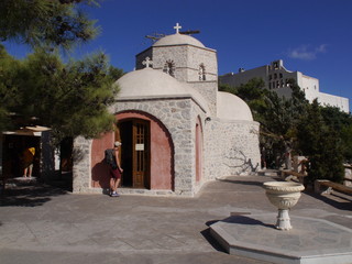 Fototapeta premium Details of the exteriors and interiors of the Orthodox monastery of the prophet Elijah located on the mountain of the prophet Elijah on the island of Santorini, Greece.