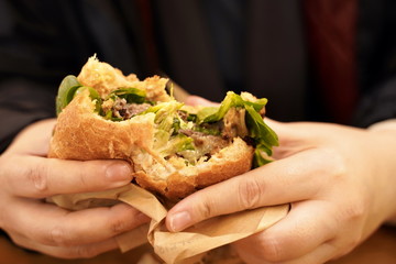 Cheeseburger in Hand