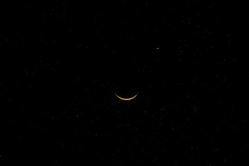 Obraz na płótnie Canvas The crescent moon on the sky and stars in the dark night