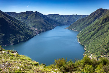 Fototapeta na wymiar Spring panorama of Lake Como seen from the town of Pigra