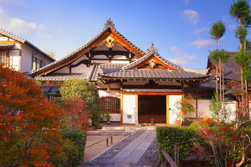 Small Ancient traditional Japanese buddhist temple in Arashiyama, Kyoto, in the autumn season, or momiji.  Exteroir.