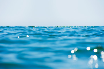 Lights on sea background. Waves.