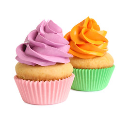 Delicious birthday cupcakes with buttercream on white background