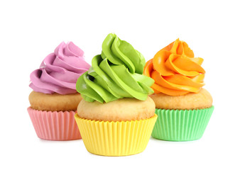 Delicious birthday cupcakes with buttercream on white background