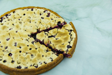 Blackcurrant and blueberry pie with protein sauce