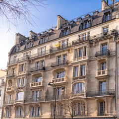 Fototapeta na wymiar Paris, typical facade and windows, beautiful building boulevard Richard-Lenoir