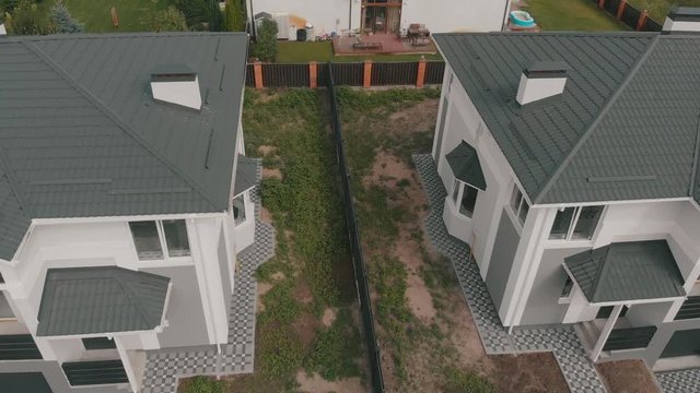 Aerial view classical townhouses. Duplexes