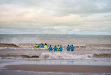 group of walkers in the water in the north of France