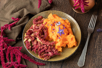 Fried Amaranthus caudatus flowers with sweet potato puree