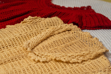 Crochet dresses and table tops, View of yarn ball with needed and crochet pattern