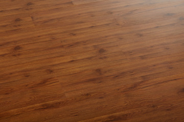 Fototapeta premium Wooden natural texture. New parquet blank. Wooden laminate floor boards background image. Home decor.