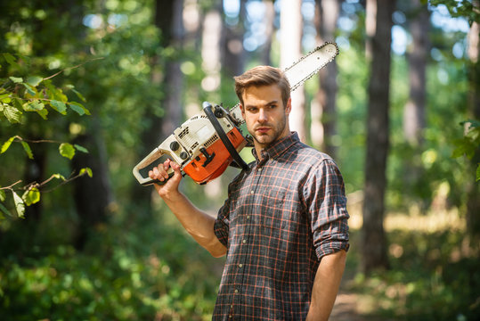 poacher in forest. deforestation. ranger or poach. man forester use saw. search firewood for picnic campfire. Surviving in wild nature. human and nature. man hiking in wood. No care and no rush