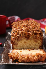 Homemade cupcake with oatmeal, apples and crunchy cereals oatmeal on a metal tray on a dark background, Vertical format