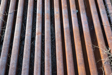 Steel railroad tracks with rust  background