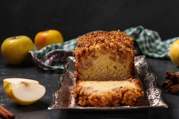 Homemade cupcake with oatmeal, apples and crunchy cereals oatmeal on a metal tray on a dark background