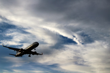 Fototapeta na wymiar Airplane flying in the sky.