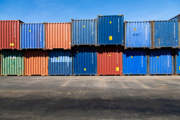 Marine and carrier insurance concept. Cargo container yard. cargo shipping container box in logistic shipping yard. colorful cargo container stacks in shipping port.