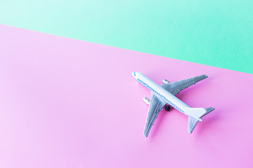 toy airplane model on Abstract light backdrop. Air flight journey concept. Space background. Journey vacation holiday. 