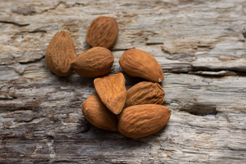 Group of shelled almonds in the foreground