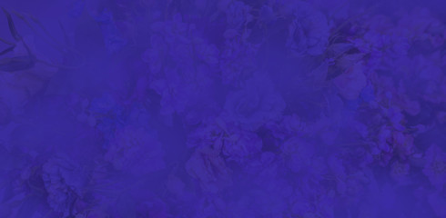 Classic Blue Pantone color Leafs in garden background.